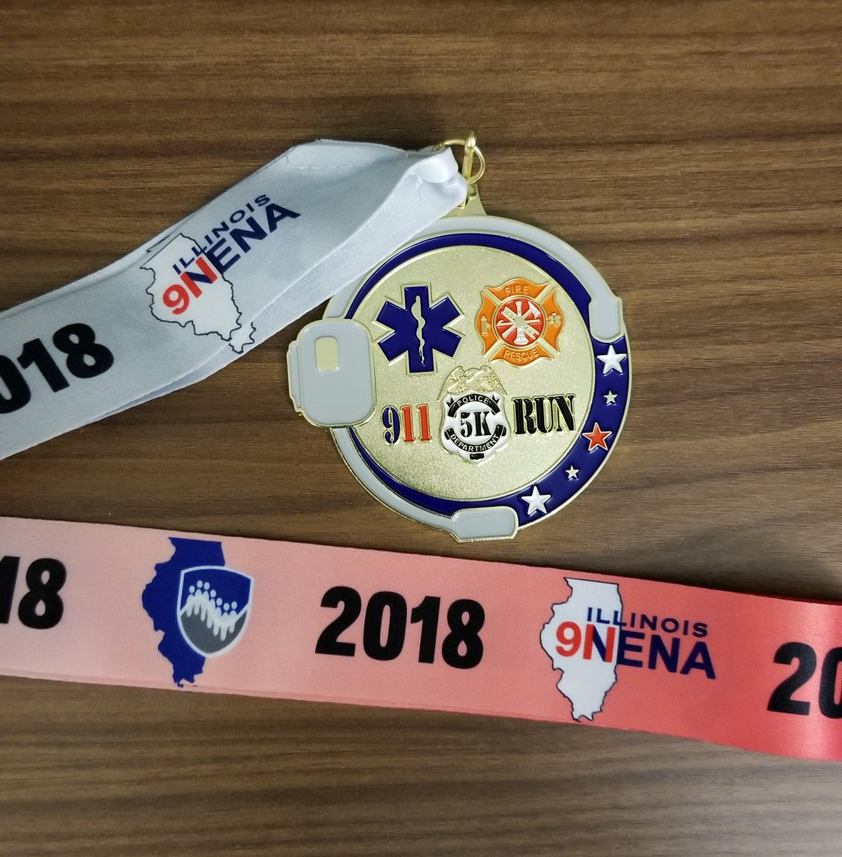 The medal awarded to the participants of the 5K yesterday at the <a href="/IPSTA911/">IPSTA Conference</a>. <a href="/ILAPCO/">Illinois APCO</a> <a href="/911NENA911/">NENA</a>