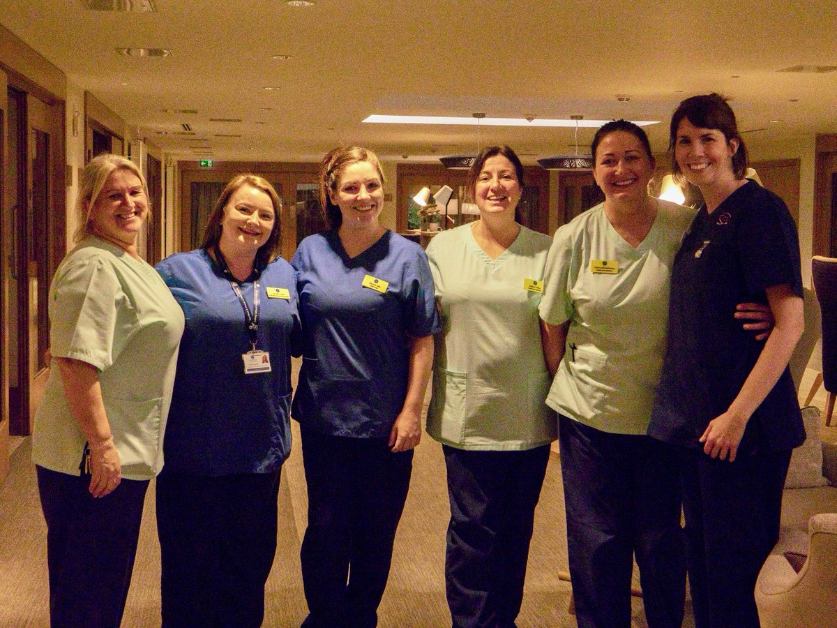 Six of our day service staff smiling broadly
