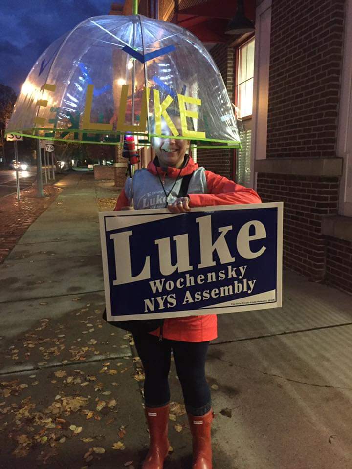 LukeforNY's tweet photo. Look at this dedicated volunteer dancing in the rain drumming up more excitement for Luke! #electLuke  Polls close at 9 PM. https://t.co/azfqjW6x8P