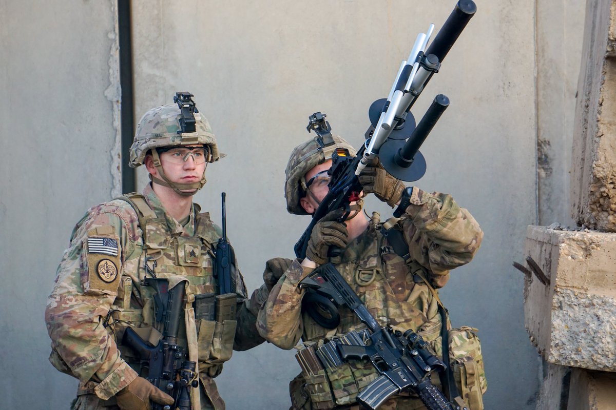 CENTCOM's tweet image. 1st Squadron, 3rd Cavalry Regiment Troopers operate the Drone Defender during a counter-unmanned aerial system drill Oct. 30. The Drone Defender is an electromagnetic rifle that jams a drone’s GPS signals and radio control frequencies. @CJTFOIR