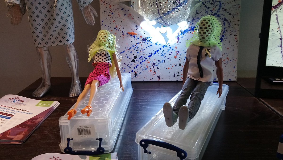 Barbie and Ken demonstrating radiotherapy masks to take away some of that fear #HNCCONF2018 #HNCSM