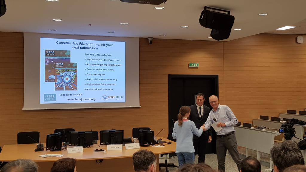 rjerala's tweet photo. Petra Sušjan from @BiotehNIC @kemijski receiving Best poster prize awarded by @FEBSJournal at @MIcrobiotaMI. Congratulations to Petra and @HafnerIva ! https://t.co/qxc7Xaj9XJ
