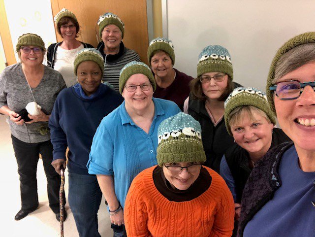 This adorable group is all smiles, proudly showing off the hats they made in our Stranded Colorwork Knitting class. Such a cute design and perfect for winter!