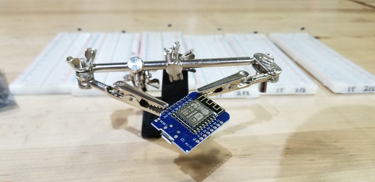 KodyKinzie's tweet image. 7 esp8266 modules down, 14 neopixels soldered, no burns yet #d1mini