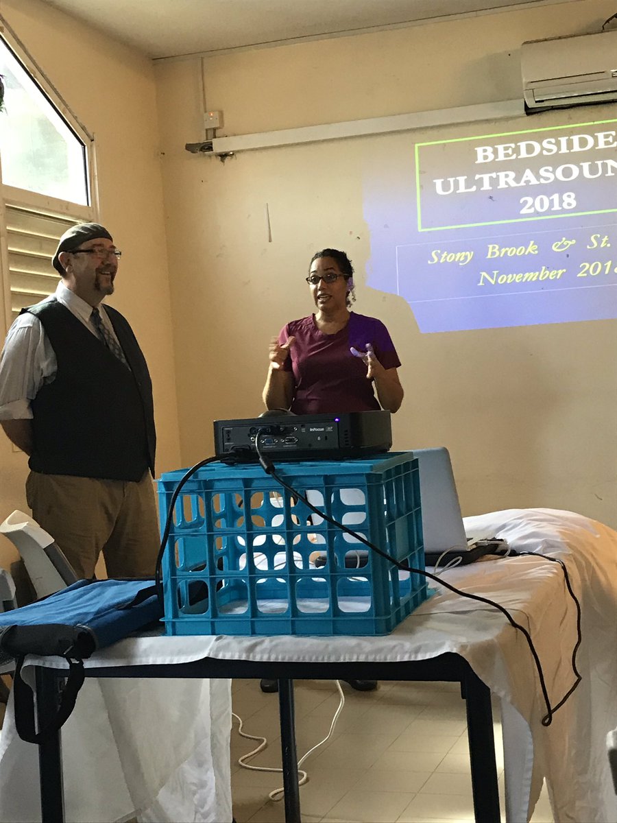 StonyBrookEM's tweet photo. Stony Brook International Division and Ultrasound Division starting our week at Victoria Hospital St Lucia teaching bedside US #internationalmedicine https://t.co/u09mBiKx2Q