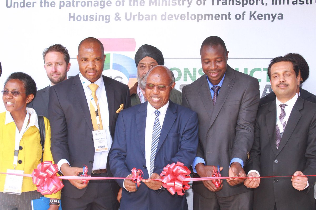 CapitalFMKenya's tweet photo. Prof. Paul Maringa (Centre) PS Public Works, Prof. Godrick Bulitia (left) Vice Chairman, NCA and Eng. Maurice Akech (right) officially open the National Construction Week, featuring the International Construction Research Conference and Exhibition (ICORCE). #ICORCE2018 https://t.co/BhTV8lUdhI