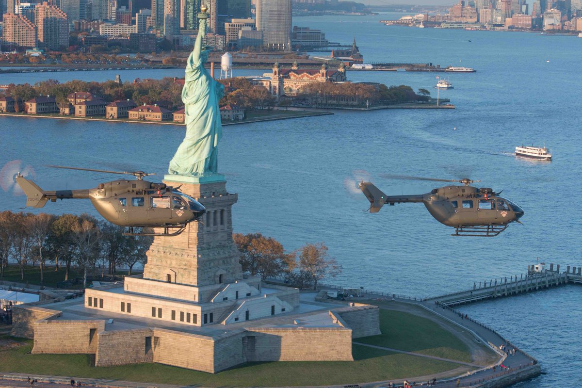 AirbusHeli_usa's tweet photo. The @USarmy UH-72A Lakota helicopters fly past the Statue Of Liberty. The Lakota is produced by @AirbusHC_usa at our Columbus facility in MS. Photo credit: Ryan Mason https://t.co/3U5UAHtfiR