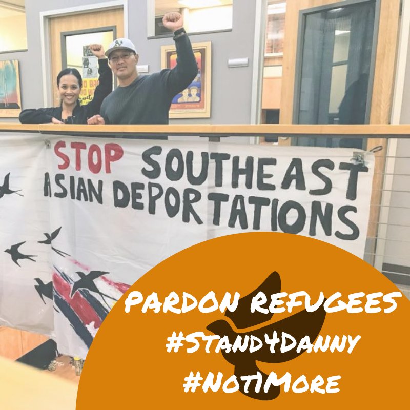 Two organizers stand behind "Stop Southeast Asian Deportations" banner with their left arms raised in fist. Caption in the corner reads, "Pardon Refugees #Stand4Danny #Not1More"