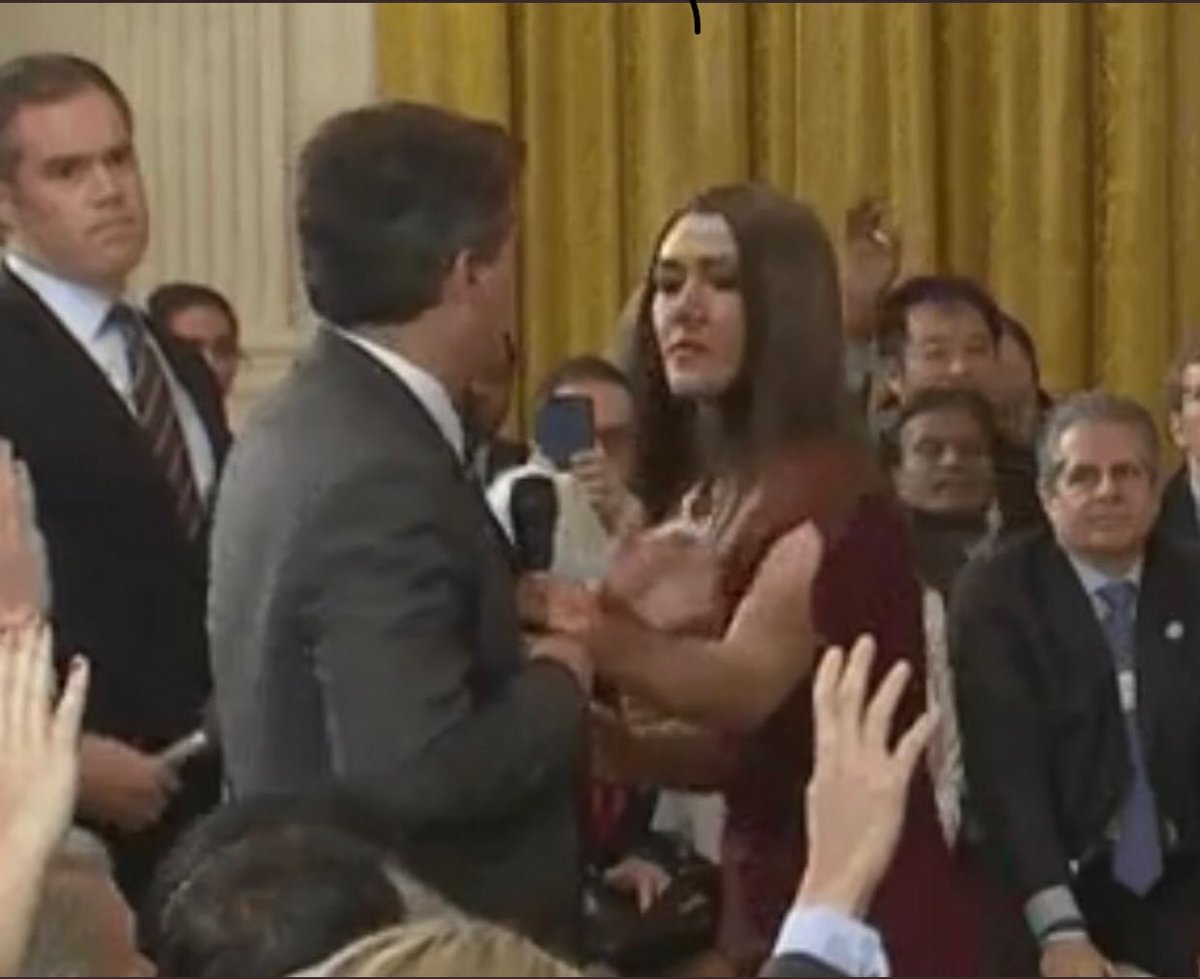 Jim Acosta shoves woman trying to keep microphone - Trump destroys