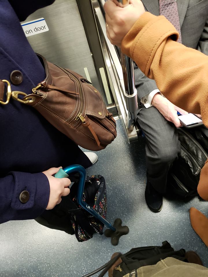 MediocreBeard's tweet photo. I watched this guy look at this old woman's cane before going back to reading on his phone. I called him an asshole to his face before exiting the train. Feel free to do the same if you bump into him during your commute! #pathnj #jerseycity #grovestreet @PATHTrain https://t.co/unYevJ2DiJ