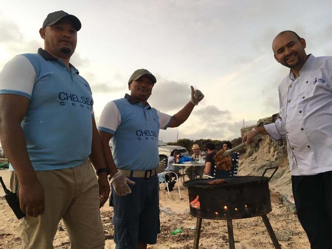 ChelseaVillage's tweet photo. We work in a high-risk environment but we still want our guests to enjoy their down time. @ChelseaVillage recently organised a beach barbecue for our @BBC_CurrAff guests, as well as TV presenter and Paralymic athlete @AdeAdepitan complete with a #Mogadishu sunset https://t.co/WxvHQ7WwAK