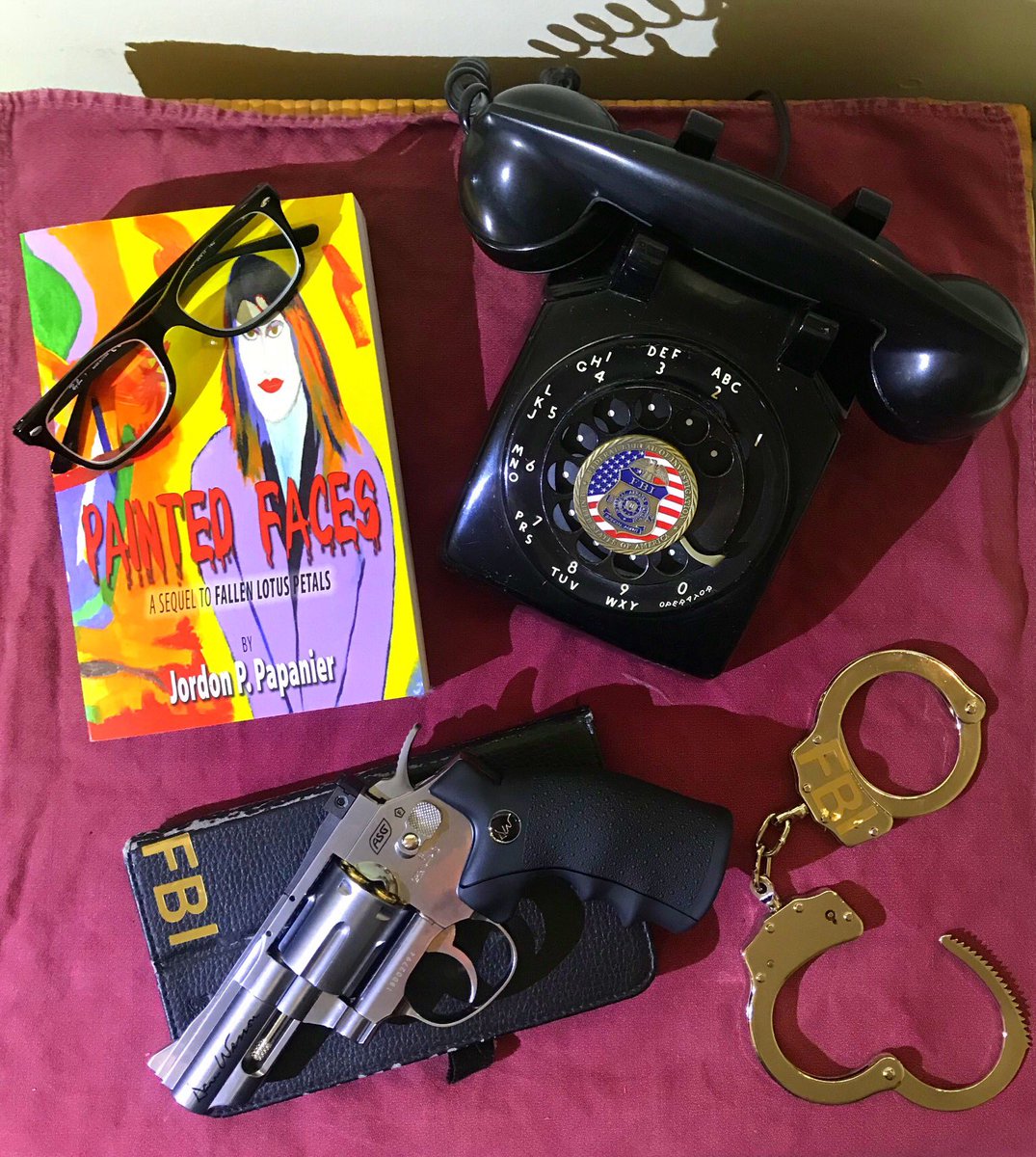 Webconnect88's tweet photo. Make sure the safety is on before you start your bedtime reading. #bookpaintedfaces #bookpaintedfacesart #novelpaintedfaces #reading #pleasure #readingforpleasure #bedtime #handgun #pistal #revolver #rotaryphone #art #deskphone #handcuffs #FBI #crimethriller #book #novel https://t.co/dyldHswYlg