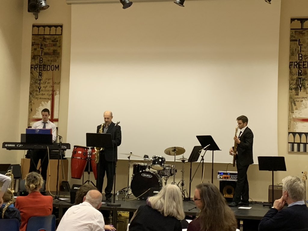 Staff trio on stage! 🎹🎷🎸