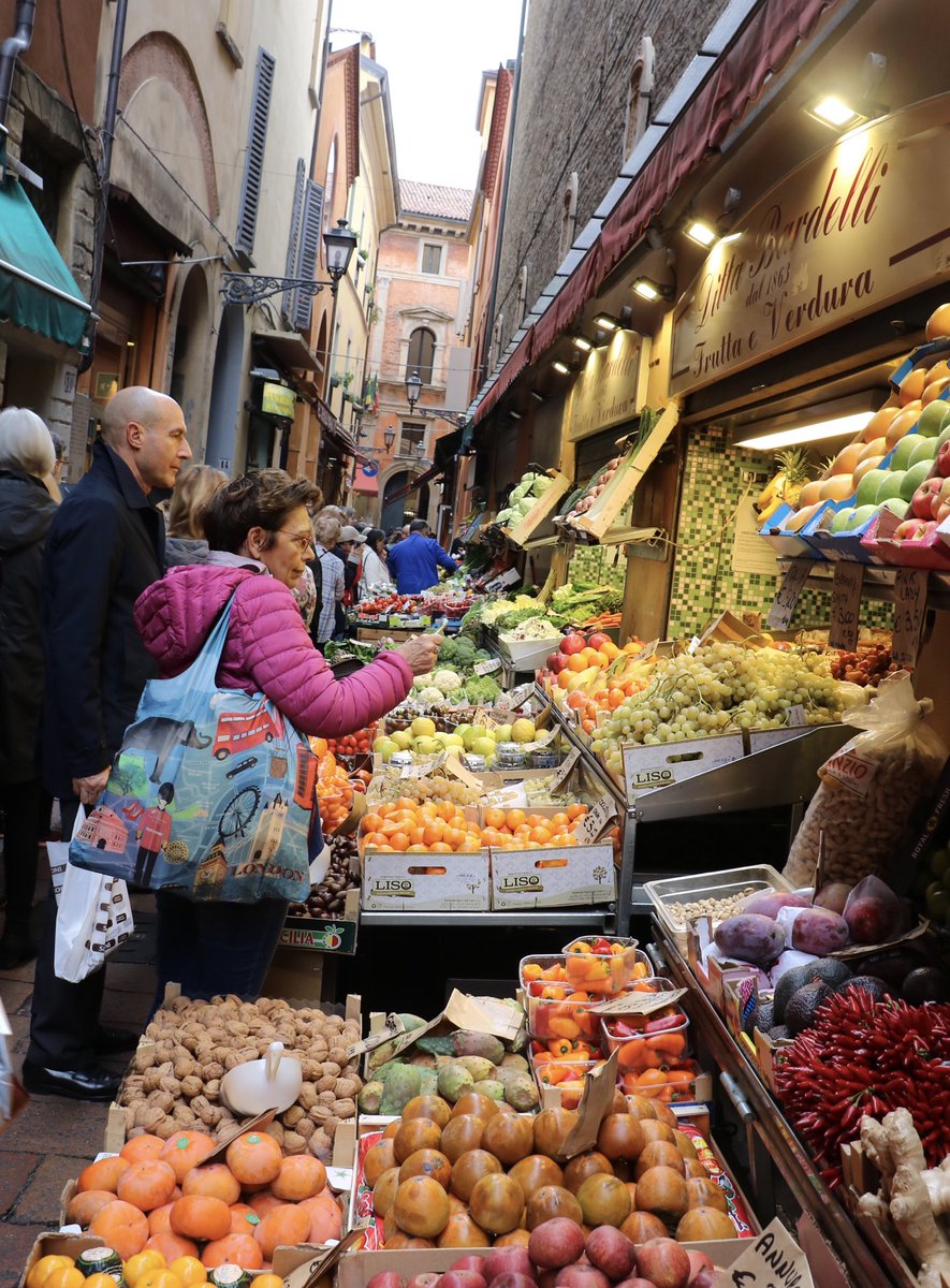 GroupTravelMac's tweet photo. The market district in #Bologna, Italy draws crowds seeking #butcher shops, fresh #vegetables, #fish vendors and #freshcutflowers. #Collette100 #traveltogether https://t.co/7VVhP2GA8a