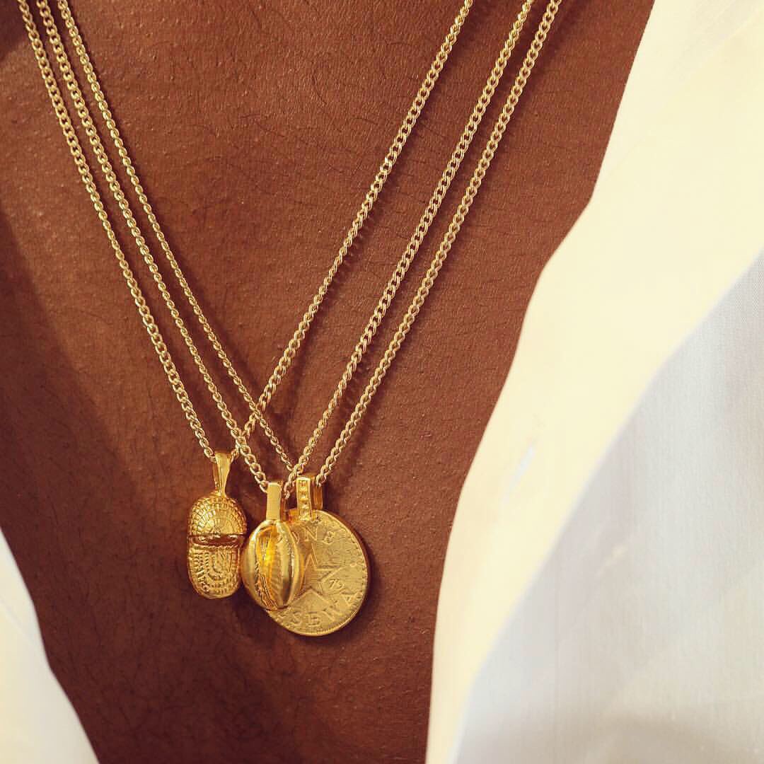 nanakwabena's tweet photo. Hype for the launch of our collaboration with @OmiWoods. The COWRIE III Necklace. The MOSES Basket. The GHANA Talking Drum Coin. A portion of all proceeds supports Sickle Cell Disease @AllOneBlood. #AfricanMedallionSwank https://t.co/H1IEE9qOlt