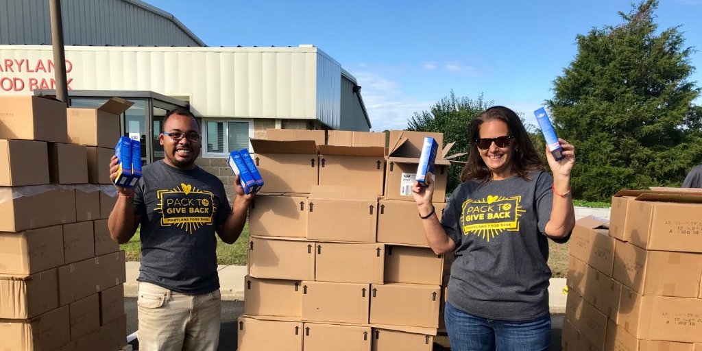 MDFoodBank's tweet photo. There were blue skies and sunshine for #PacktoGiveBack in Salisbury. The event resulted in more than 3,500 holiday meals for our hungry neighbors on the shore. All of this was made possible thanks to the generosity of @PerdueFarms, PerdueAgribusiness, and @piedmontair. https://t.co/nEn0dZnYvT