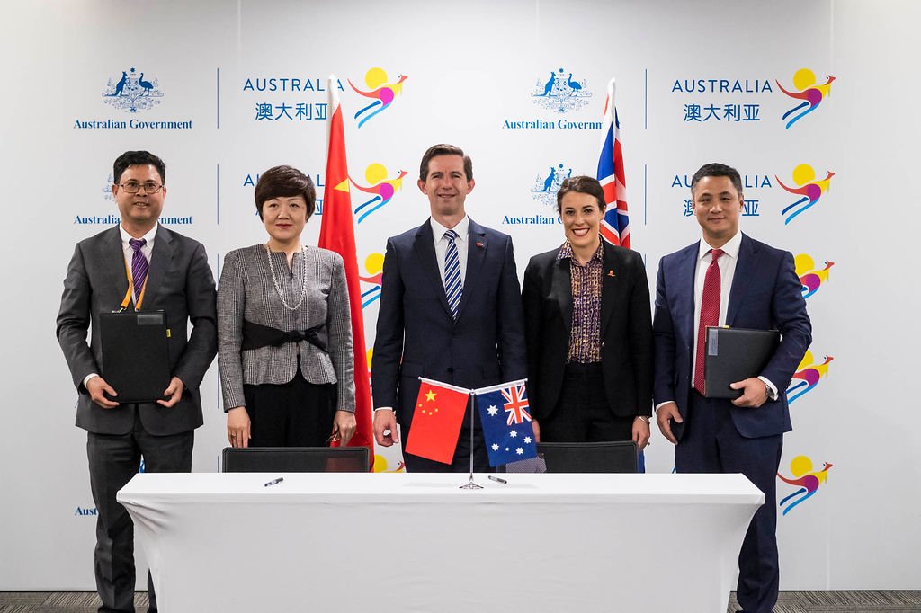 dfat's tweet photo. Trade Minister @Birmo witnesses deals worth nearly $15b during the signing of commercial MoUs at the China International Import Expo. Deepening Australia’s engagement with China, our largest trading partner. #CIIE18 https://t.co/9vBzRWwqVF https://t.co/kU3j5JezNp