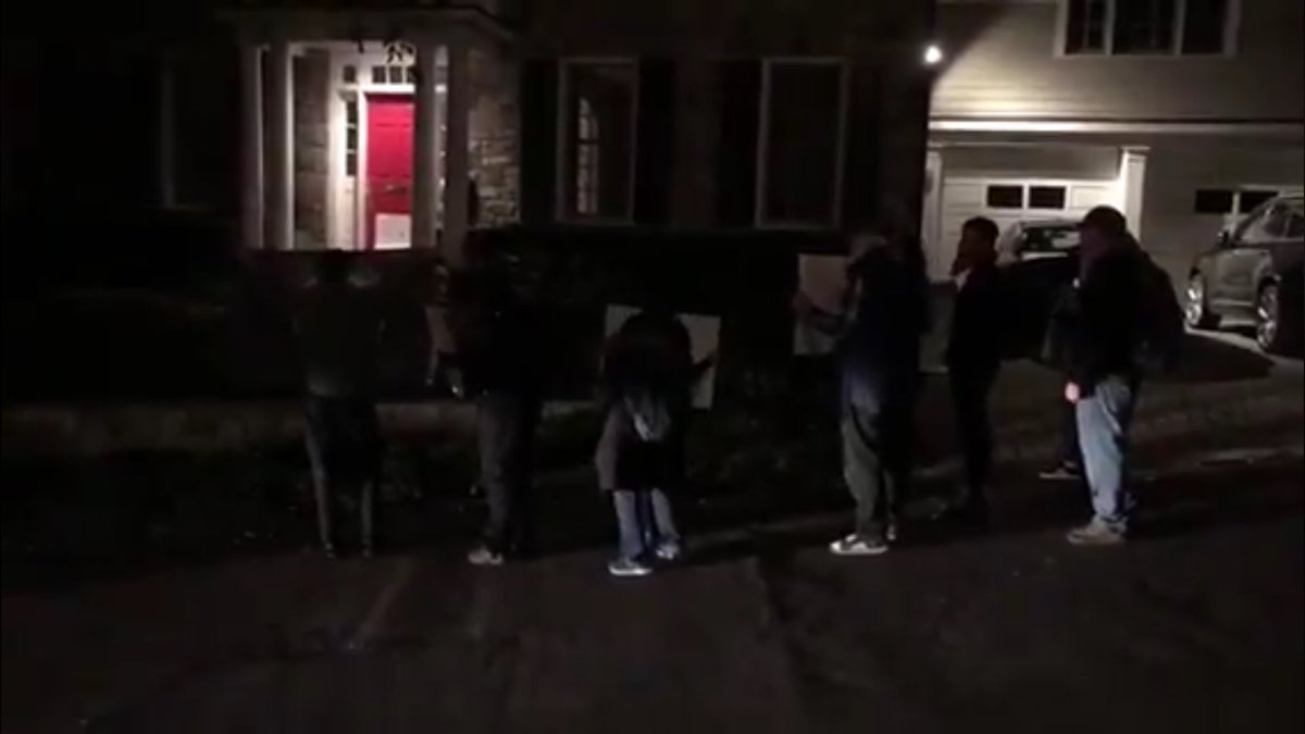 Leftist mob cracks front down of Tucker Carlson's home