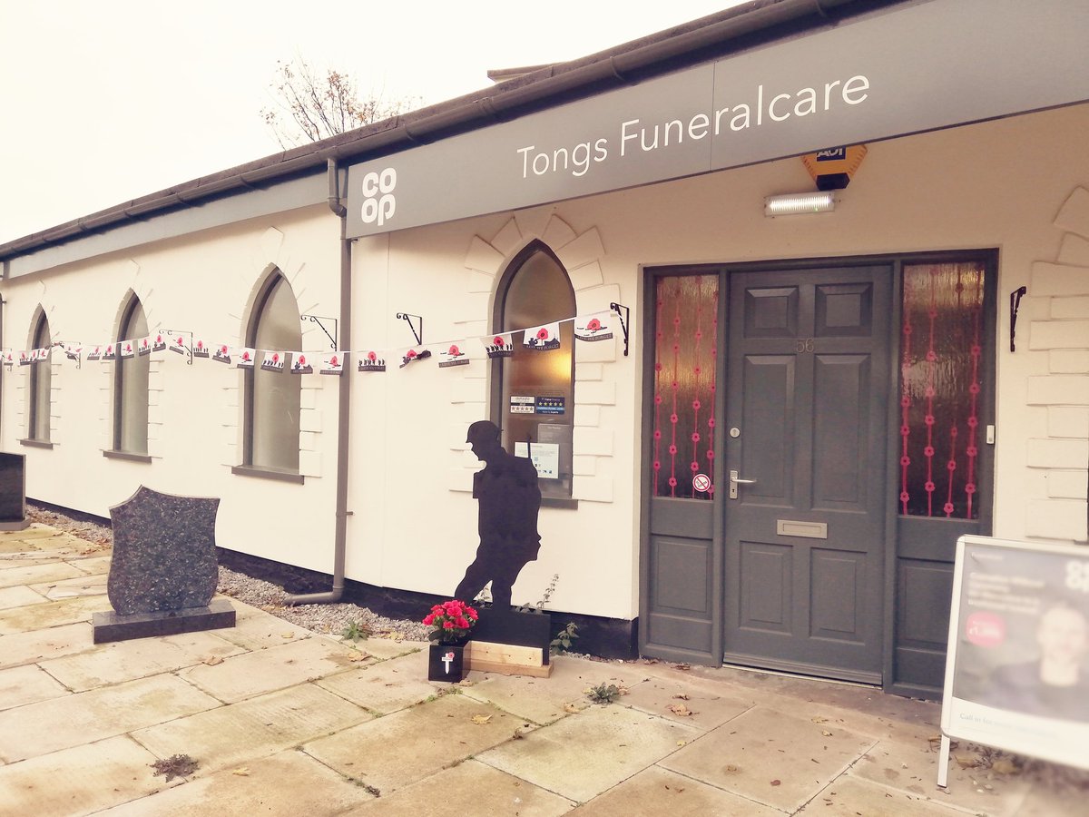 EmmalouiseOwen0's tweet photo. Lovely display at Tongs Funeralcare #rhyl for remembrance #LestWeForget silhouette created by a local artist. @CoopFuneralcare @DanStev69318579 @BritishRedCross https://t.co/oHBWizmpnV