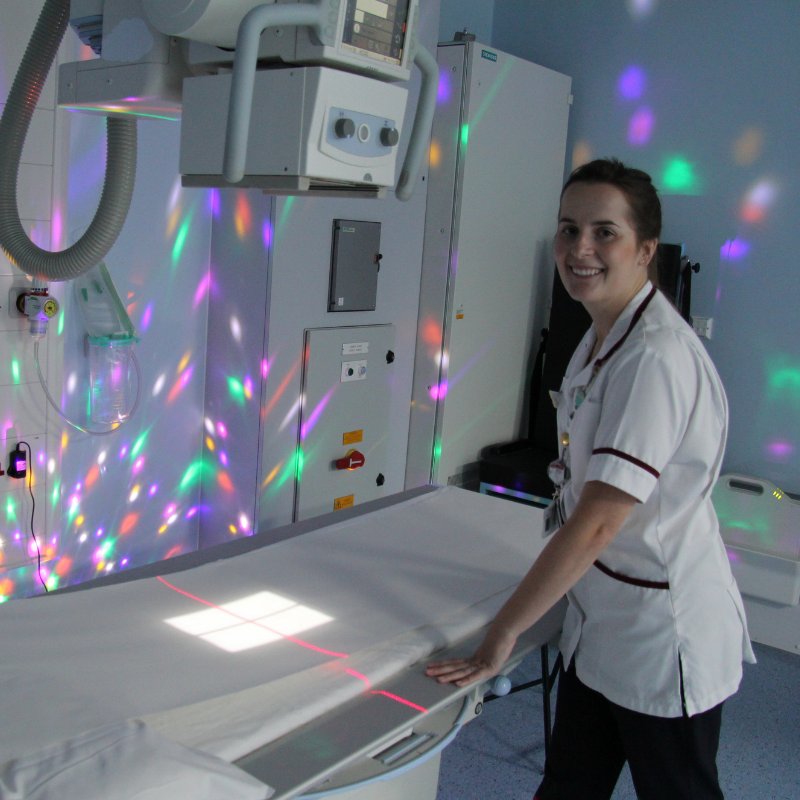 EvelinaLondon's tweet photo. We've been spending time with Lucy, Evelina London's superintendent radiographer, today. Here, she's preparing the bed in the x-ray room. 

These colourful lights help to keep our patients entertained and calm while they are having scans.

#EvelinaLondon #WorldRadiographyDay #NHS https://t.co/72vWOF2Jfo