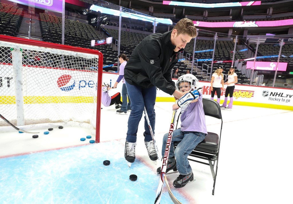 NHLPA's tweet photo. As part of the @Avalanche’s Break the Ice program, Gabriel Bourque and @Mackinnon9 joined 50 children fighting cancer and their families on the ice for an unforgettable day! #HockeyFightsCancer https://t.co/TgqXomTr5N