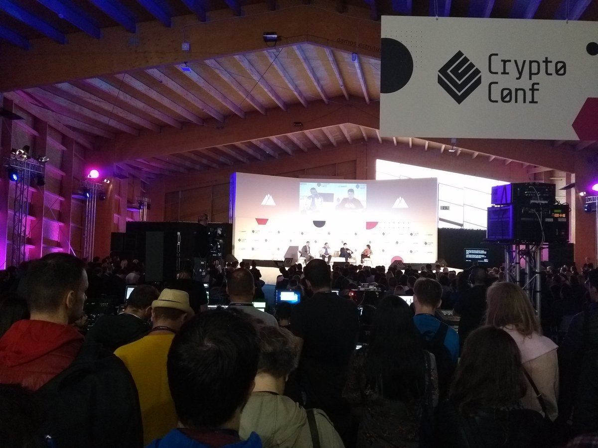 NoahPierau's tweet photo. Marco is on stage! His silver #DecredJacket and open source ethos make him stand out among other speakers. Great appearance at the #CryptoConf! #WebSummit #Decred #blockchain #crypto #WebSummit2018 https://t.co/H0Y2xKDlwy