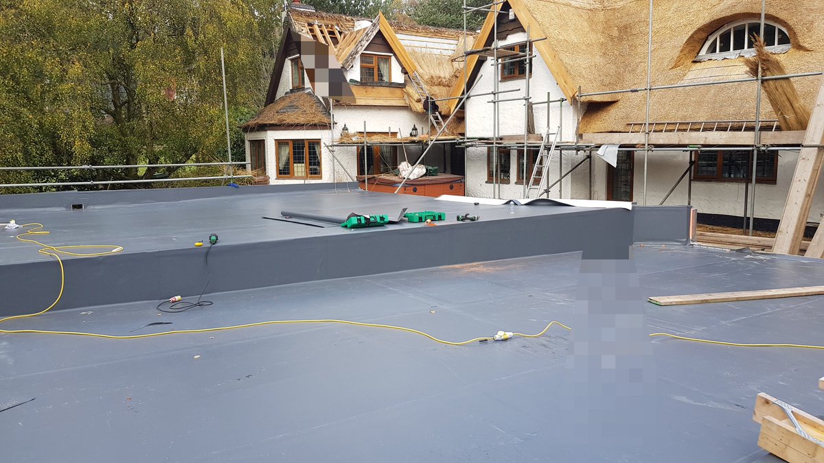 New Sarnafil and new thatch. Old style with new. Trust me, this is a roof, and it's over a swimming pool! 
#sarnafil