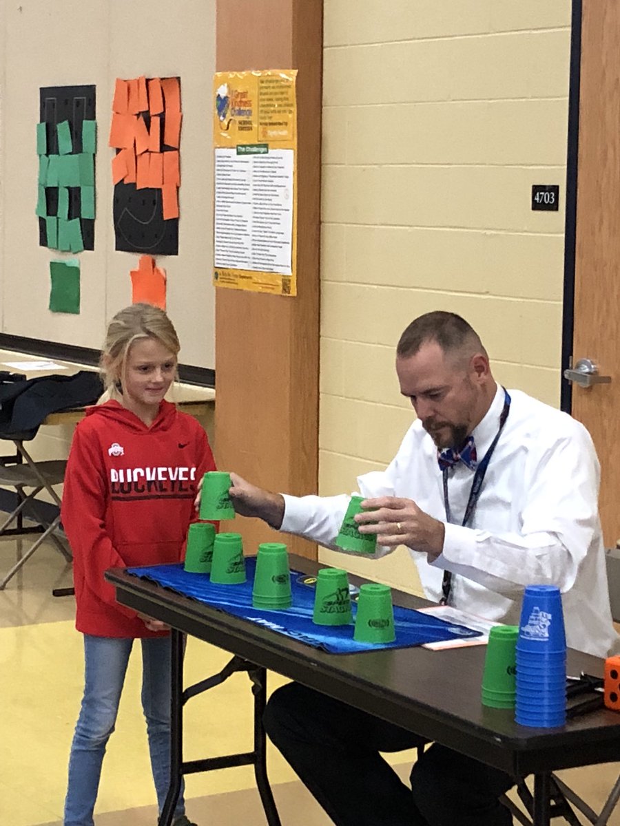 PEjacobs23's tweet photo. The kids loved picking an adult to challenge today! @PrincipalCMill going with an interesting technique. @RobBlosser @SpeedStacksInc #2018STACKUP #GESPride https://t.co/8NYVfHLbUe