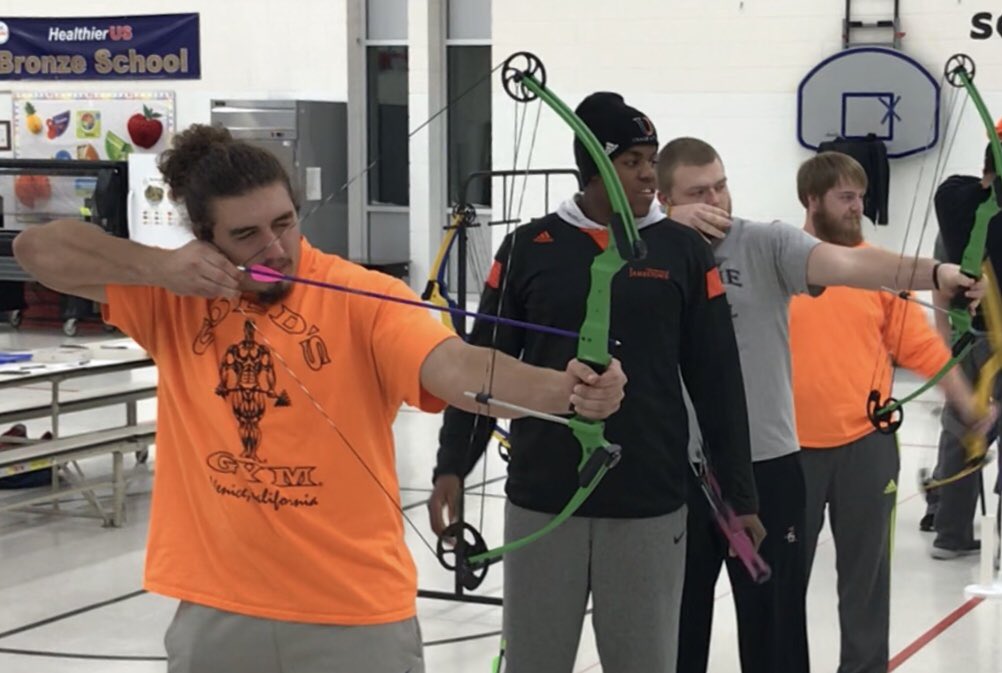 Mahoney_Cdn's tweet photo. Archery in the Schools by @michaelsmith_21. @ManissPE takes aim. But @ChanoReyes22 takes home the title!! #eastsiderules https://t.co/57kTdYEKps
