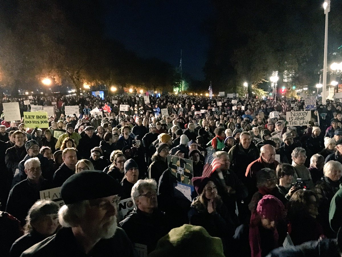 multdems's tweet photo. Scenes from #NobodyIsAboveTheLaw: 3,000 people rally! Projection of the future, perhaps? @RonWyden fires up crowd with some Constitutional talk; signs of the times! #multdems #WeThePeople https://t.co/v5aRZ61APT