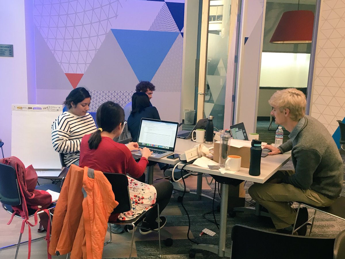 SpringerNature's tweet photo. Starting out Day 3 at the Springer Nature Hackathon! Groups are working together and with mentors to finalize their projects before they demo them in front of the judges #SN_HackDay #MixedReality https://t.co/0CFlOFAEeo