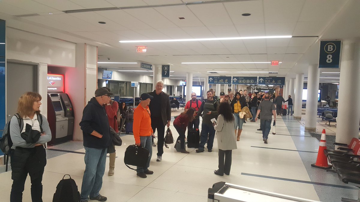 Mariojonn's tweet photo. TERRIBLE experience with #AmericanAirlines @AmericanAir Delayed by their own caused technical issue, add' 3 hours stuck on the plane, missing EVERYONE'S connection, and then waited in line for 2 additional hours to be rudely talked down to by some staff 2am https://t.co/4f011h6w0g