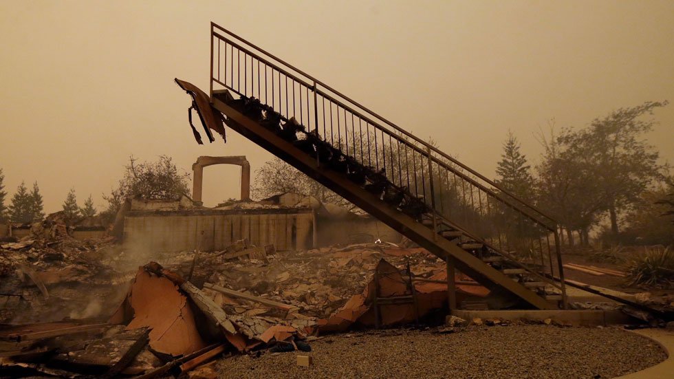 DrewMacFarlane's tweet photo. I’ve seen some pretty chilling images while working at TWC, but this one from California’s #CampFire ranks up there (via Rich Pedroncelli/AP) https://t.co/V1iRvNu2DL