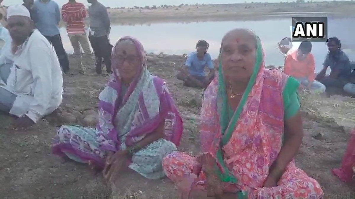 Villagers guard a pond to prevent water theft in Aurangabad's Vaijapur