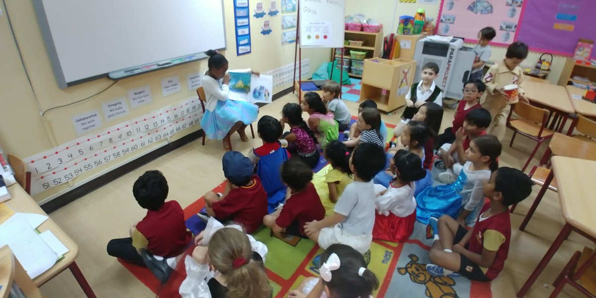 Children in year 2 enjoying listening to a story from their peer. #lovereading