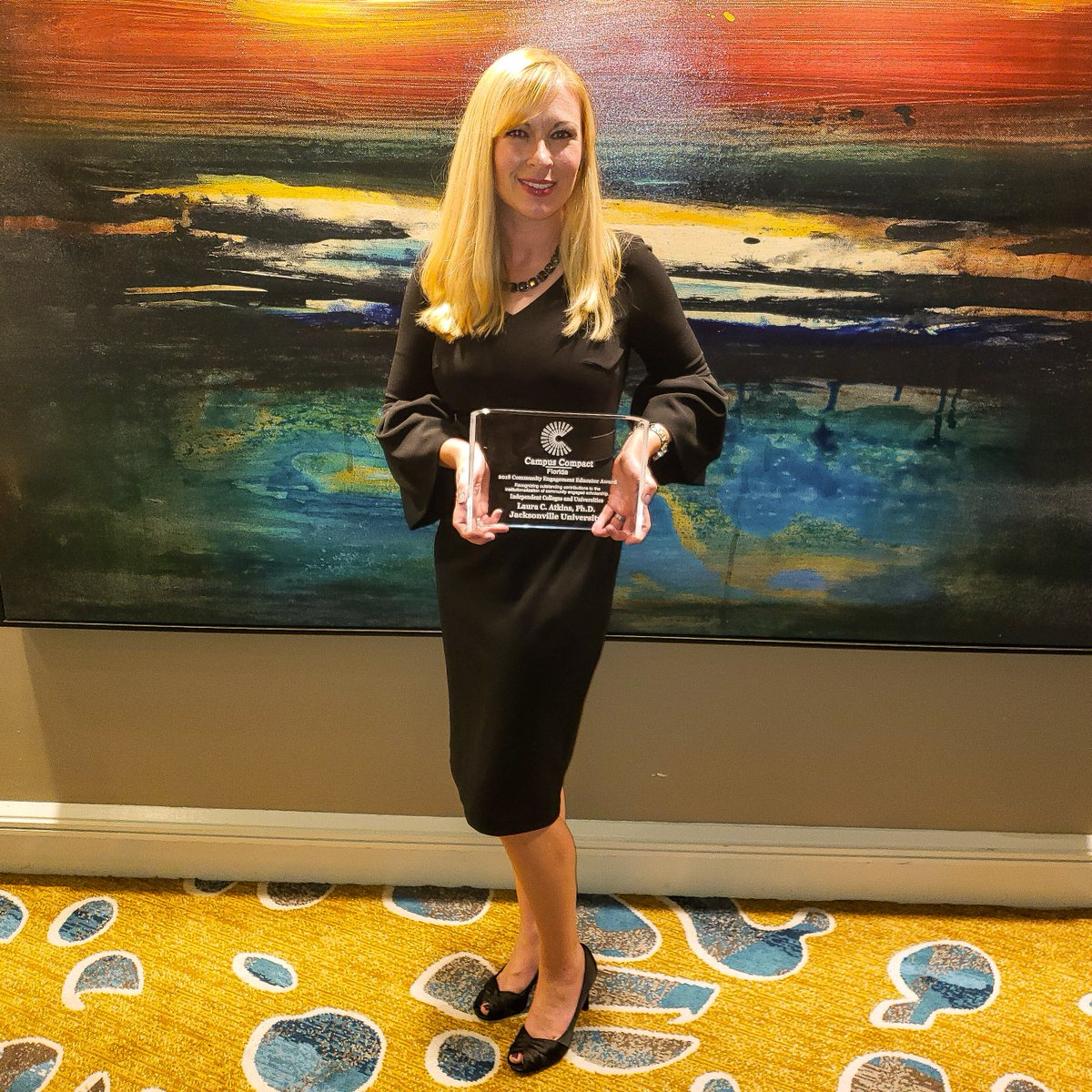 JacksonvilleU's tweet photo. Congratulations to JU Assistant Professor of Sociology and Director of Service-Learning Dr. Laura C. Atkins for winning the @FLCampusCompact Community Engagement Educator award! https://t.co/NxWHFd2eDj