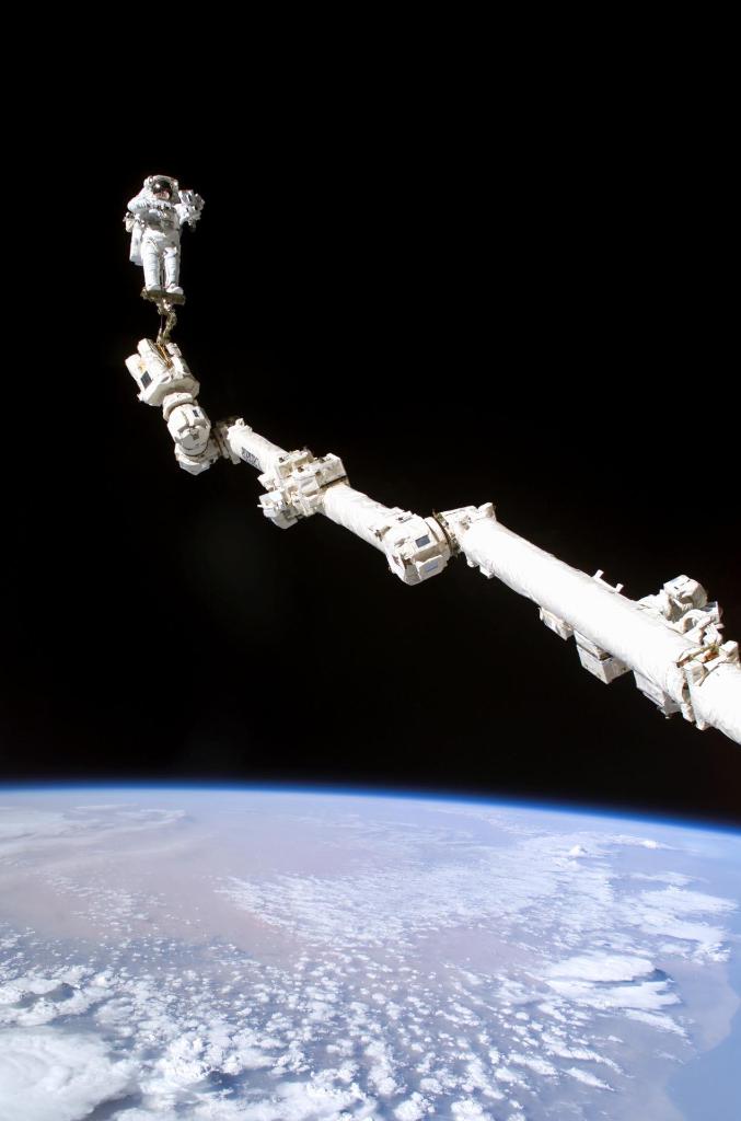 Space_Station's tweet image. The entire 55-foot robotic arm assembly, called the Canadarm2, is capable of lifting 220,000 pounds, which is the weight of a Space Shuttle orbiter. Sometimes, we use it to move cargo spacecraft or astronauts on spacewalks! #SpaceStation20th