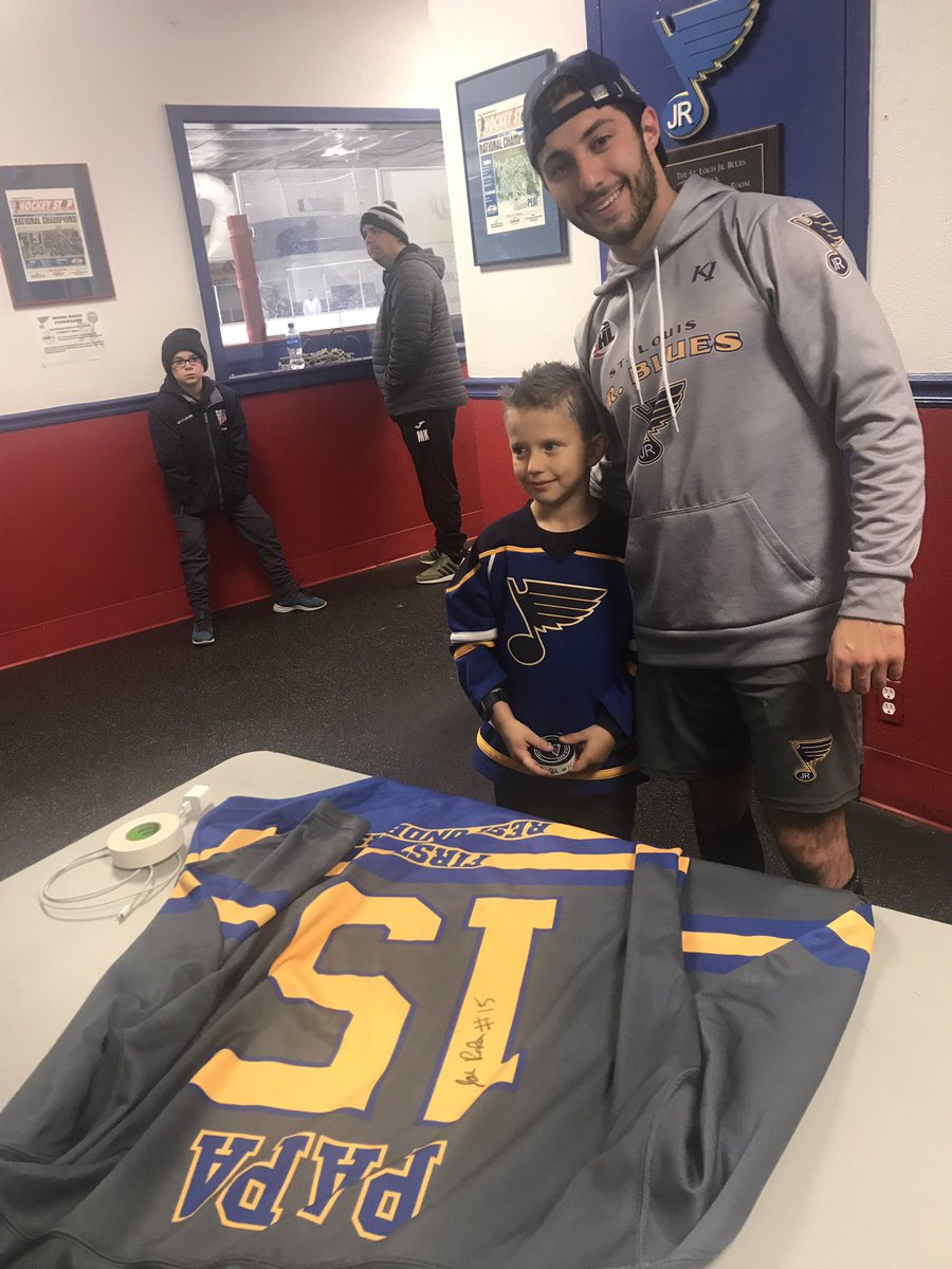 Your Captain singing his Jersey for a young fan.