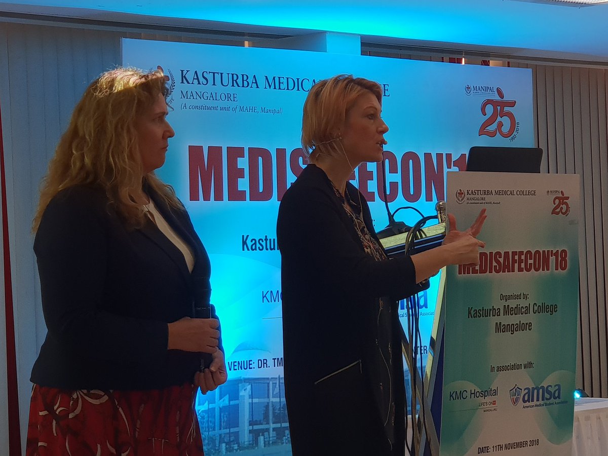 Amanda Cheesman, and Tracey Collins, flying the flag for GM nurses at the Kasturba safety conference, Mangalore, India.