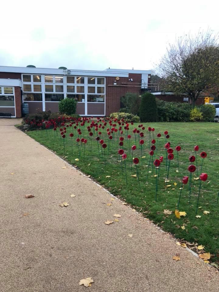 walmleyjssc's tweet photo. 100 years of remembering. Thank you to the parents, staff and children for helping to make the outside of WJS look amazing! #WeWillRememberThem https://t.co/2IbNh8irek
