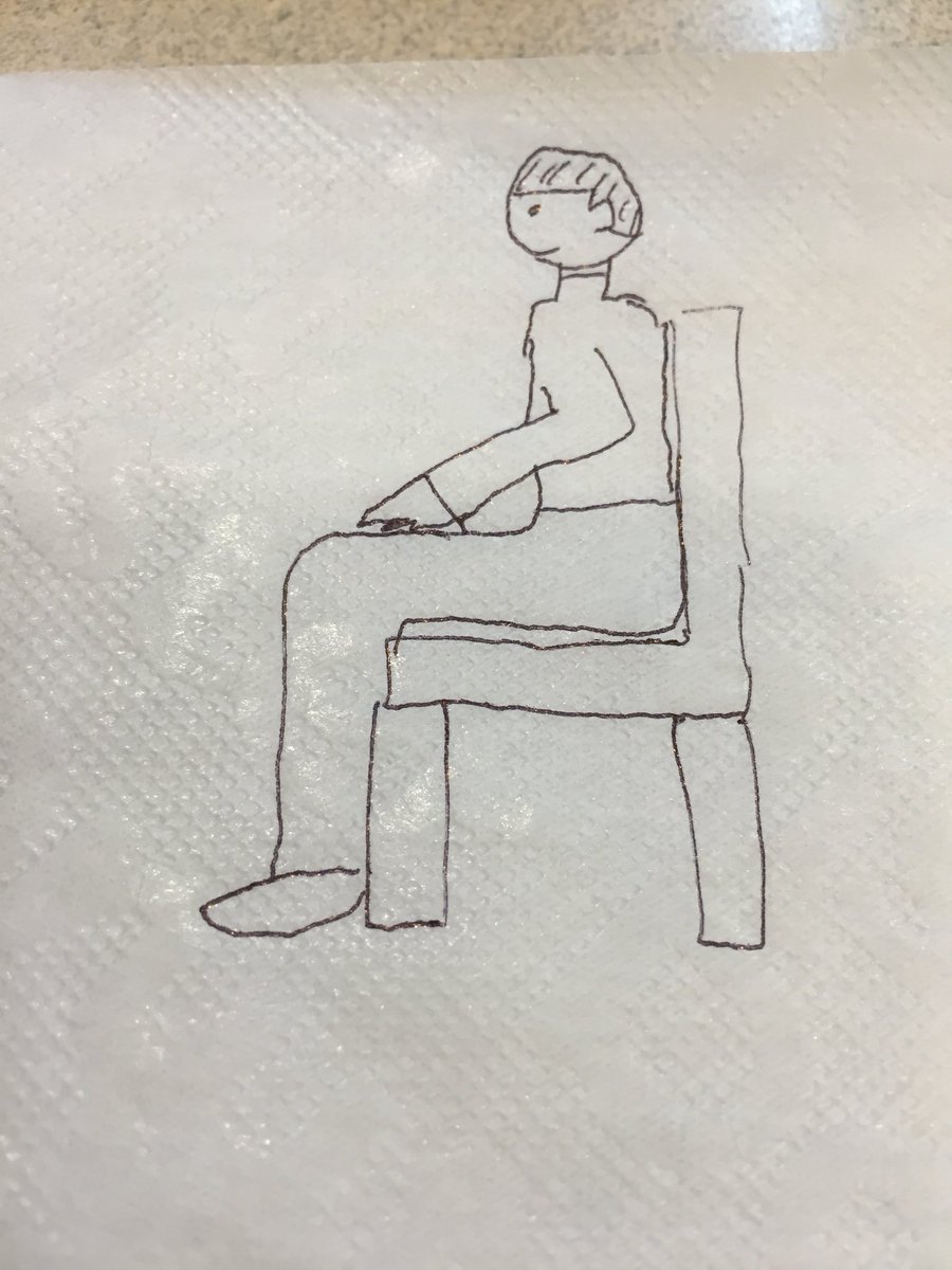 椅子に座る人