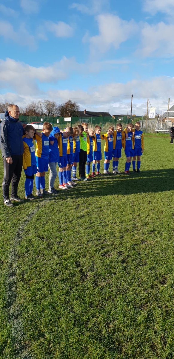 U12’s Yellow observing the silence #WeWillRemember #Remembrance100