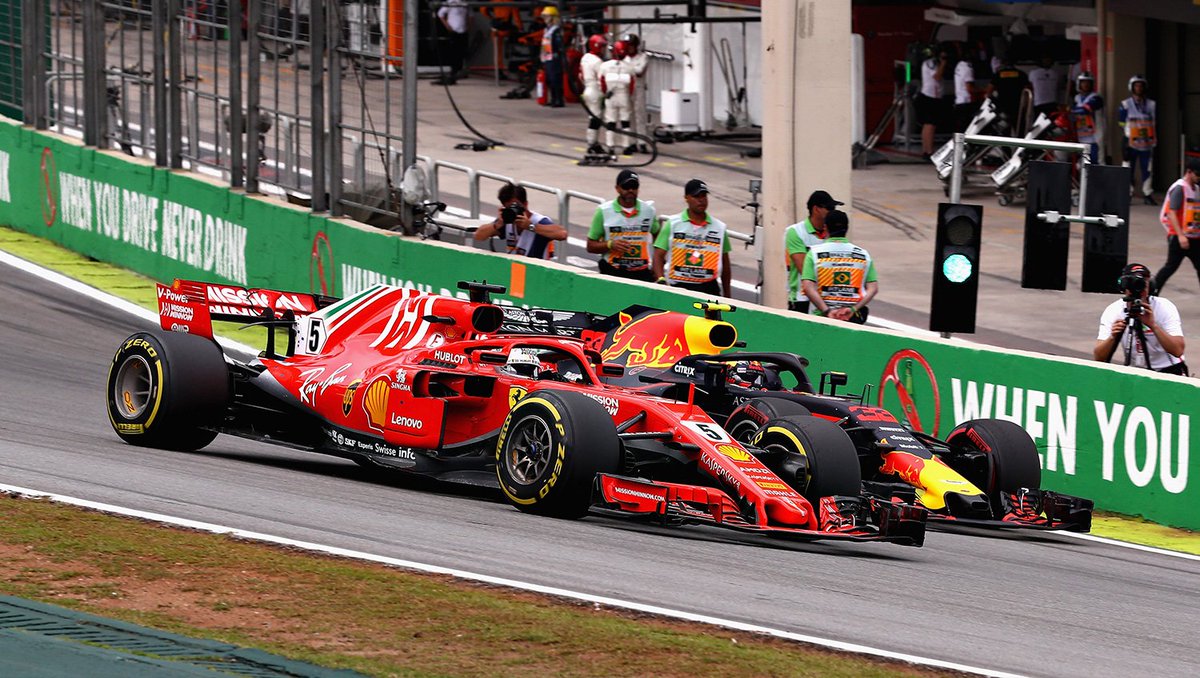 Max overtakes Vettel on the inside.