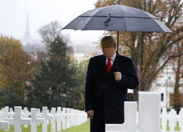 ohioherald's tweet photo. Seems like a forced visit to cemetery against his will.The  question is, why was the president alone? https://t.co/717QKnf4eM