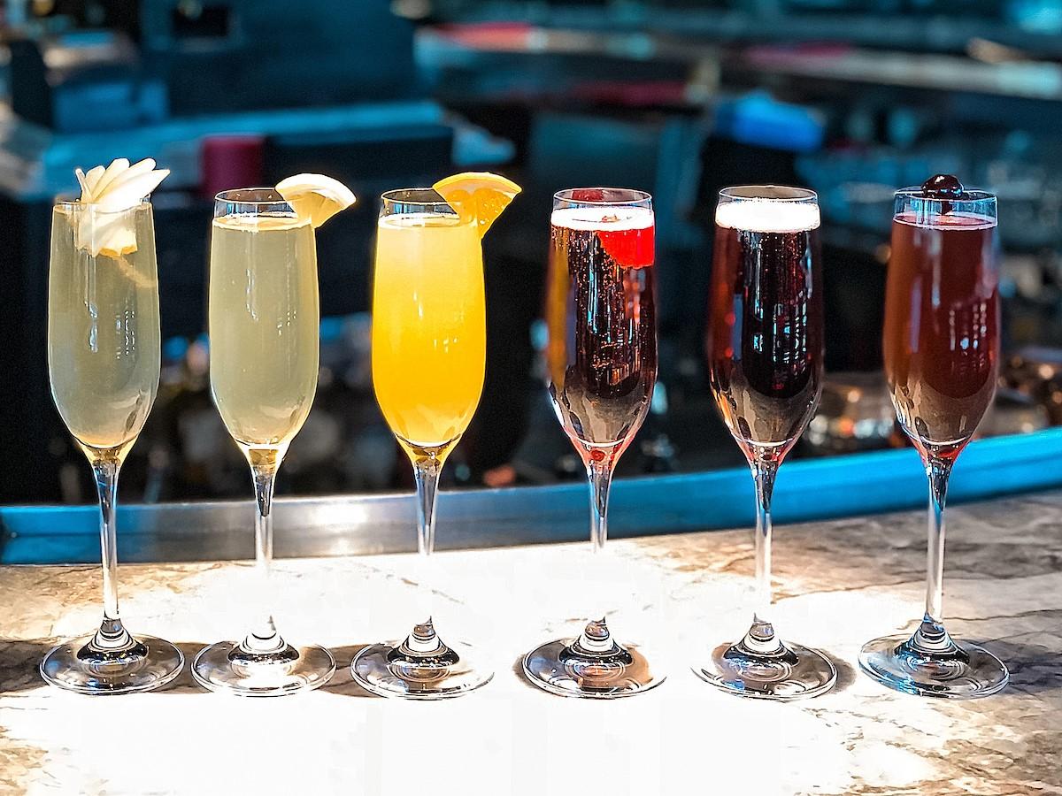 ParisVegas's tweet photo. So many mimosas, so little time. 🧡 #EiffelTowerResturant https://t.co/uT88wpf2R6 https://t.co/98QrwxB0uj
