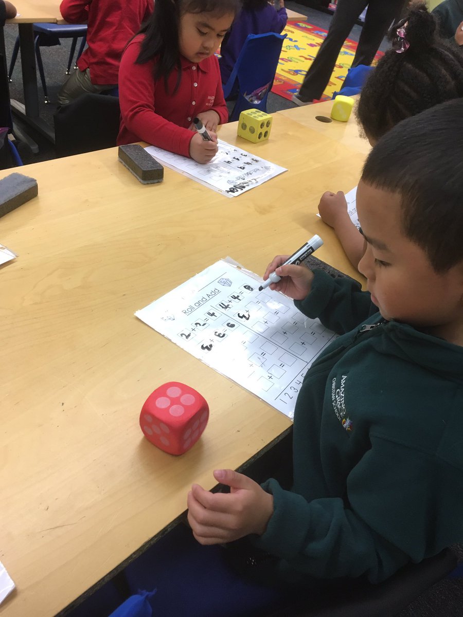KinderAGCS's tweet image. Students returned to practicing their math skills after a great Thanksgiving break! @rentonprep #rollandadd #dominoaddition #addition
