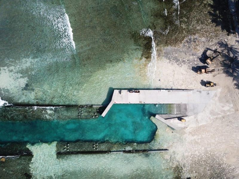MFATNZ's tweet photo. First completed wharf at Atafu #Tokelau - exciting milestone in project to improve dangerous conditions at existing wharves, accommodate new inter-atoll vessel &amp;  expected impacts of #climatechange over next 50 years. No air services to Tokelau, so 3 atolls rely on sea transport. https://t.co/HIdvCw3G2E