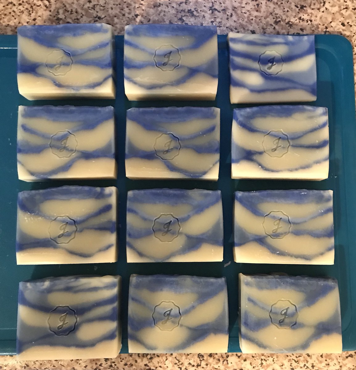 JS_NaturalSoaps's tweet photo. Trimming & stamping final batches of the year ready to wrap 💕 #PinkSwirl Geranium/Lavender/Lime #BlueSwirl Lemongrass/Rosemary/Lavender https://t.co/m52M70sdAA