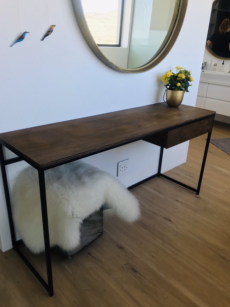 ConeyTimbers's tweet photo. In 2016 we randomly met Esta-Marita, a beautiful and creative soul, in a little town called Tankwa in the Karoo (Afrikaburn). We promised each other one day we’d make some unique art together. Esta’s designs..#diningtable #bedsidetable #steelfurniture #desk #console https://t.co/0fftttTnLs