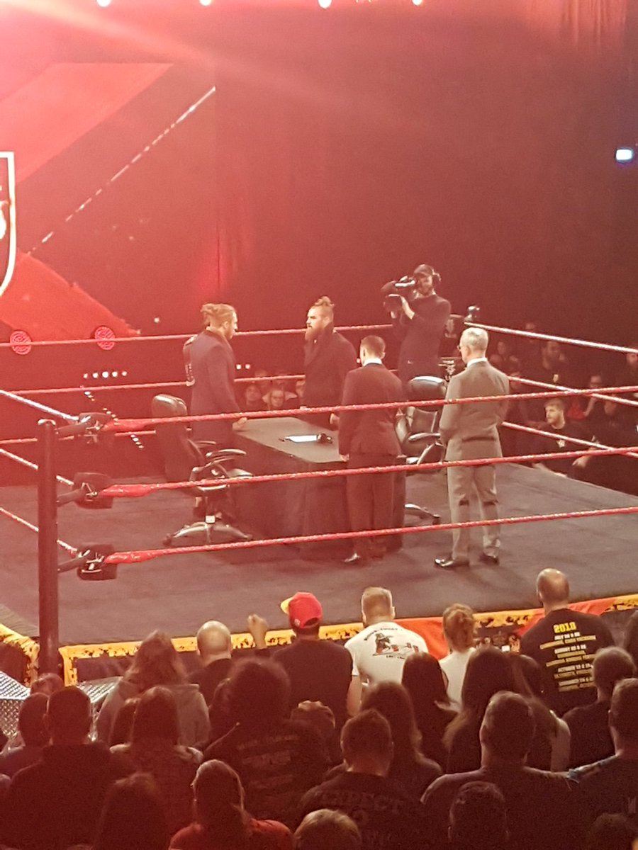 adharp123's tweet photo. #NXTUKLiverpool Classic contract signing action! Will it end up with someone going through the table? https://t.co/OV4ju6Mzr1